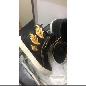 Gold wings black shoe designer
